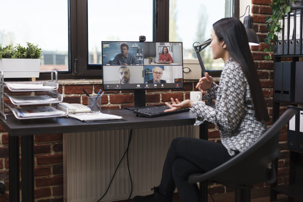 Architecture project manager leading a virtual meeting to establish client communication strategies and manage scope creep